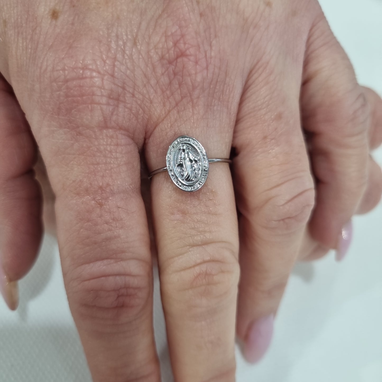 Anello acciaio medaglia madonnina e croce